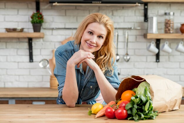 Blond woman in the kitchen