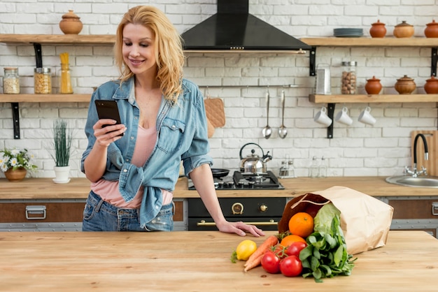 Blond woman in the kitchen