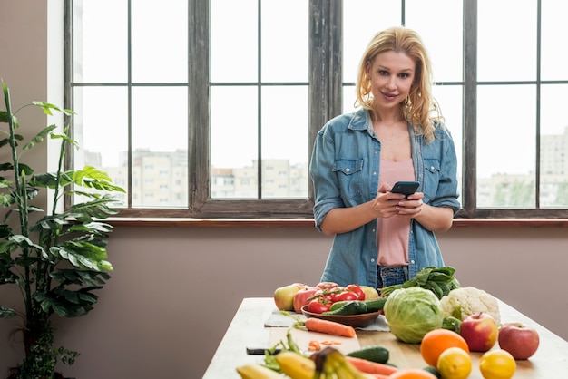 Blond woman in the kitchen