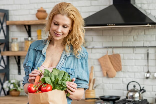 Blond woman in the kitchen