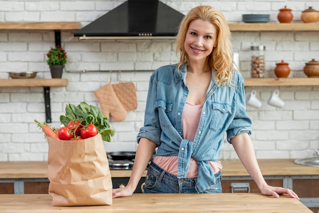 Blond woman in the kitchen