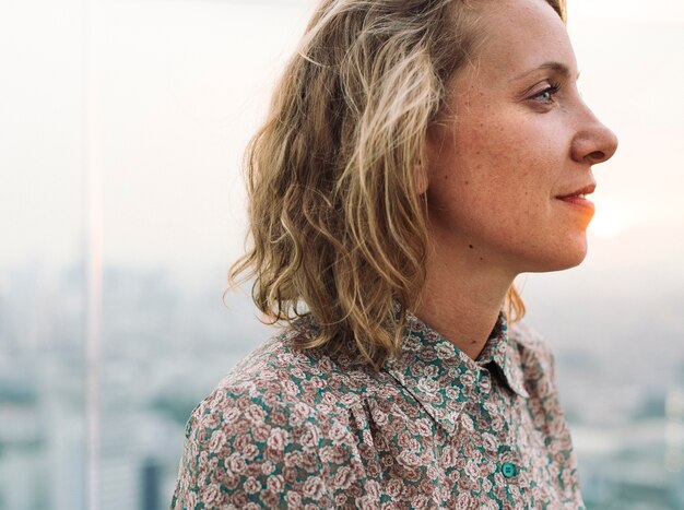 Blond woman at a rooftop