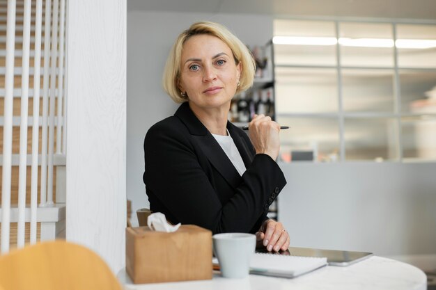 Blonde business woman at work