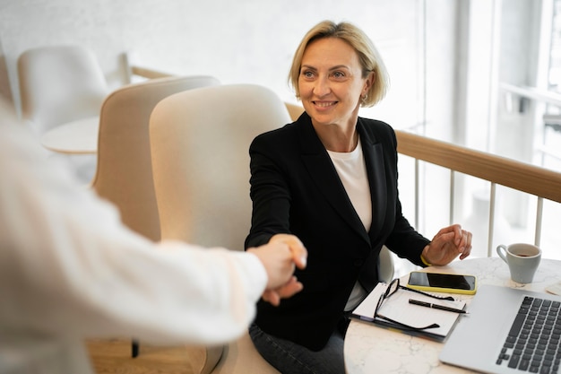 Blonde business woman working