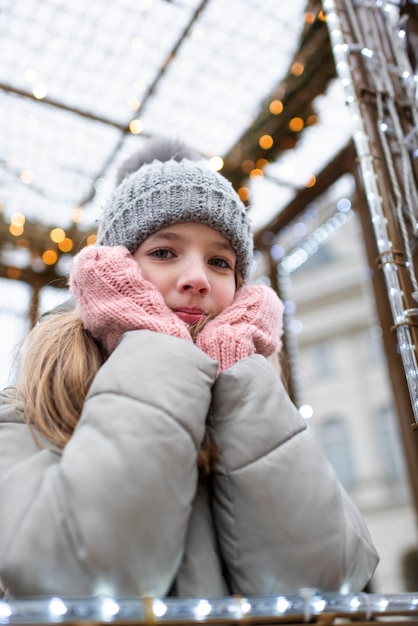 Free Photo blonde girl enjoying a trip on their christmas holidays