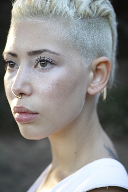 Free photo blonde model with a septum