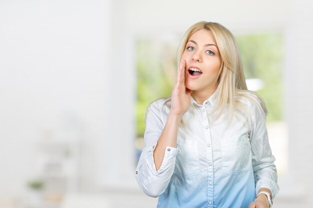 Blonde woman acting surprised and confused