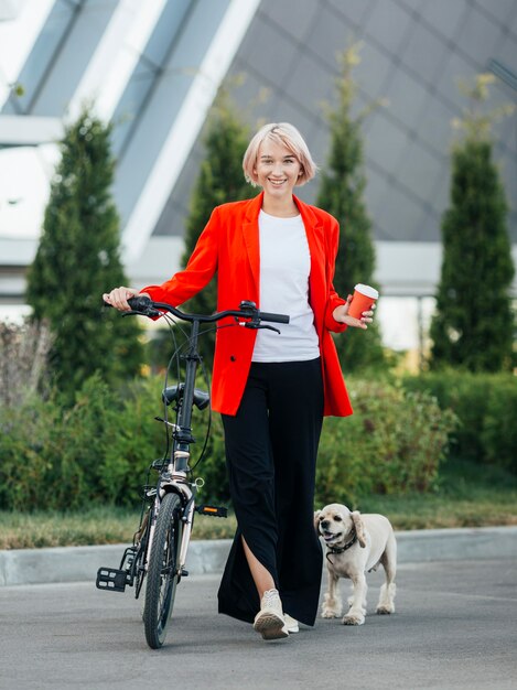 Blonde woman walking her dog