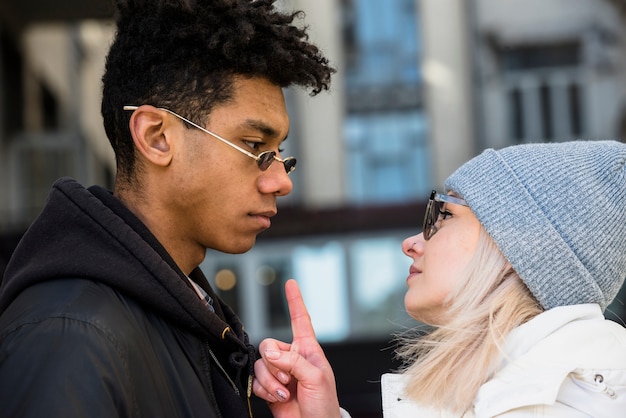 Free Photo blonde young woman blaming her boyfriend