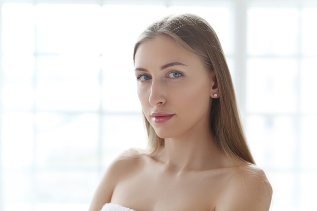 Blonde young woman posing