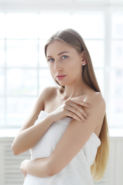 Blonde young woman posing