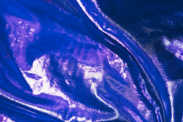 Blue abstract shiny material in background