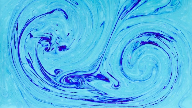 Blue abstract swirl in paint