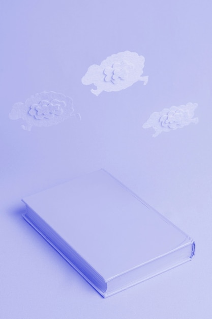 Free photo blue background with isometric book