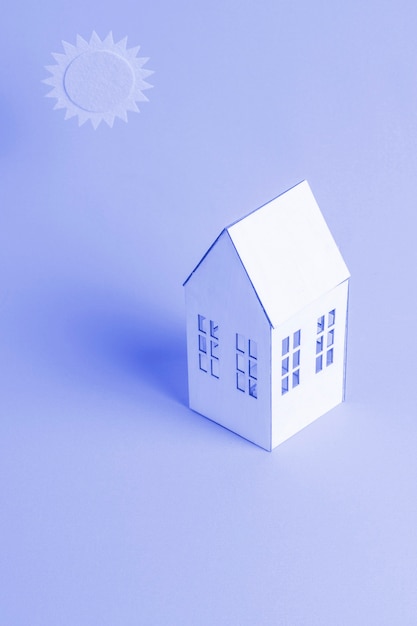 Free photo blue background with isometric house