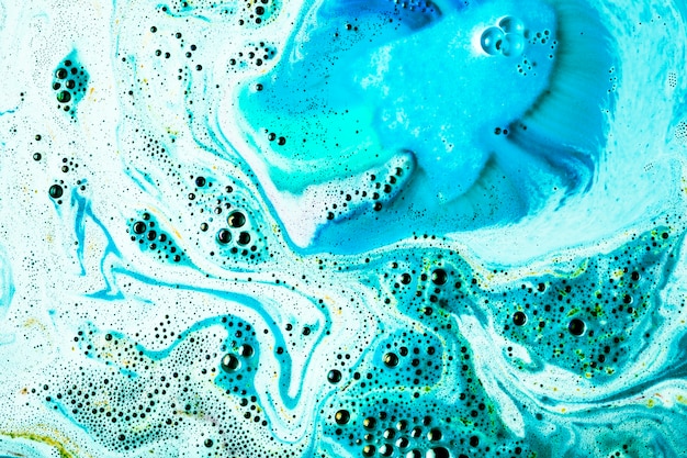 Free photo blue body care bubble bath bomb background