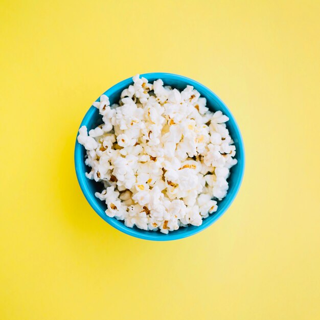 Blue bowl with popcorn