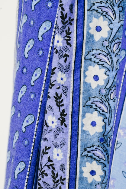 Free photo blue cloth with flowers close-up