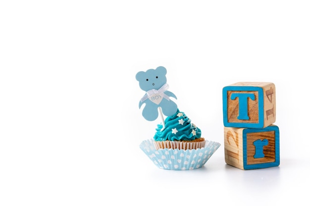 Blue cupcake for baby shower isolated on white background