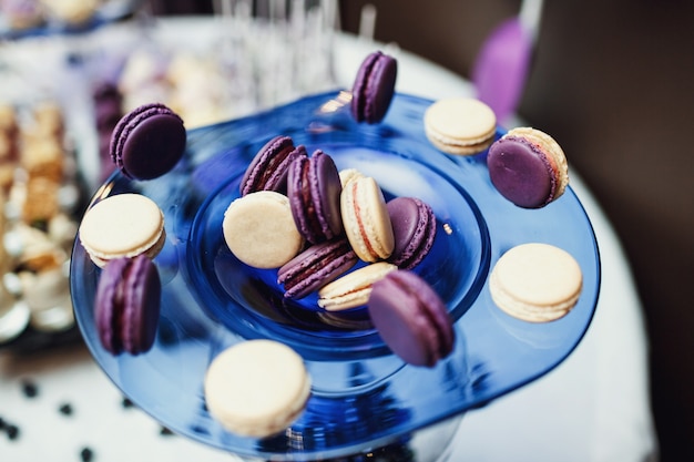 Blue dish with macaroons served