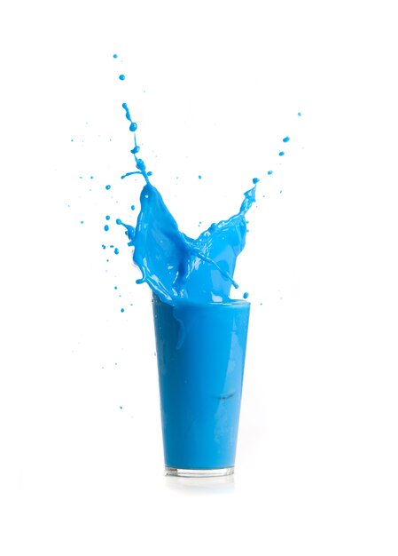 Blue drink falling in ice