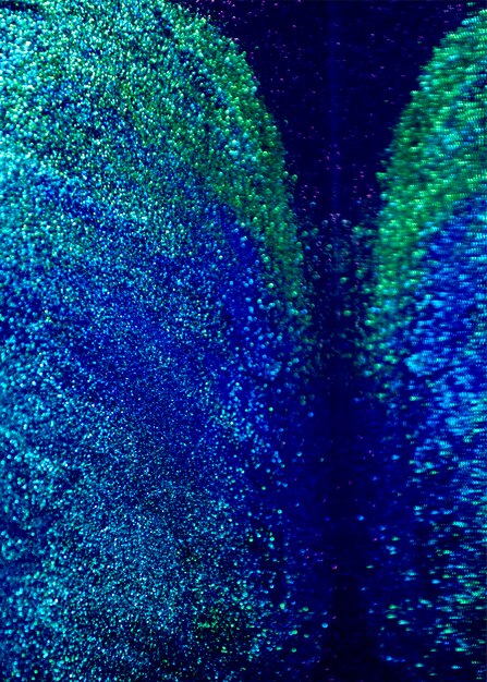 Blue and Green glitter bokeh lights background