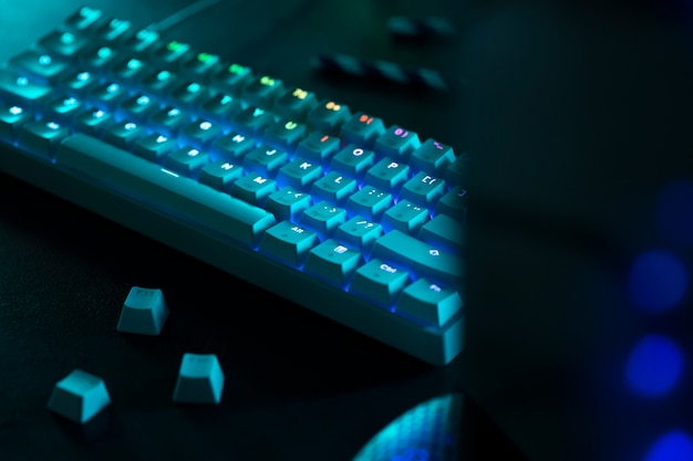 Free photo blue keyboard with lights high angle