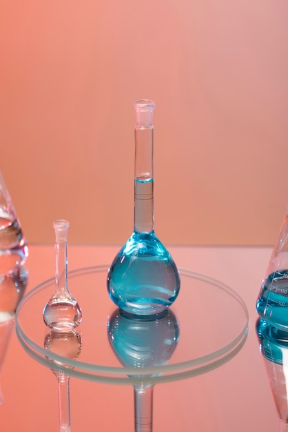 Free Photo blue liquid in laboratory glassware arrangement