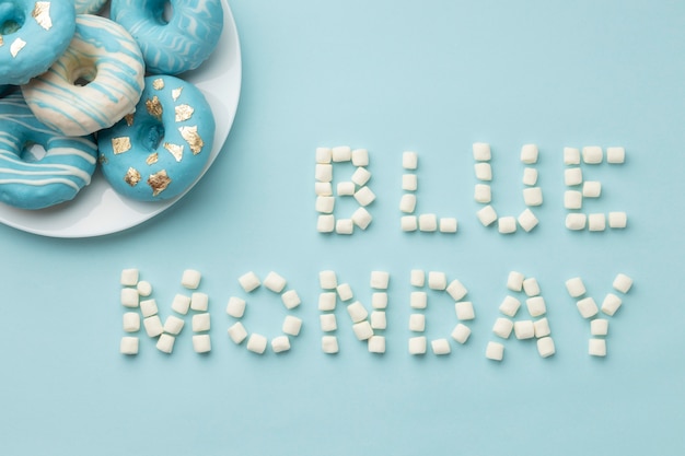 Free photo blue monday arrangement with doughnuts