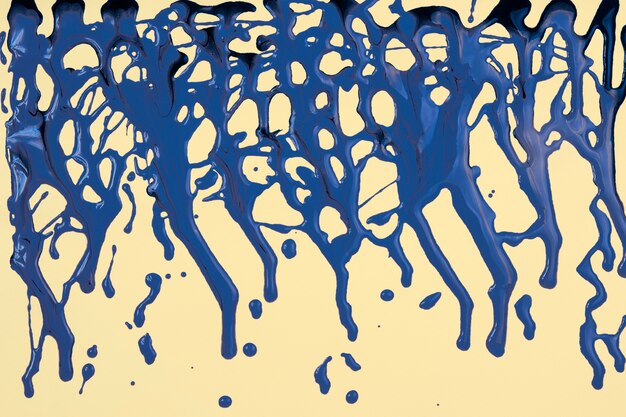 Blue paint spilled on yellow