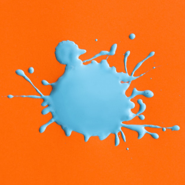 blue Paint splash on orange