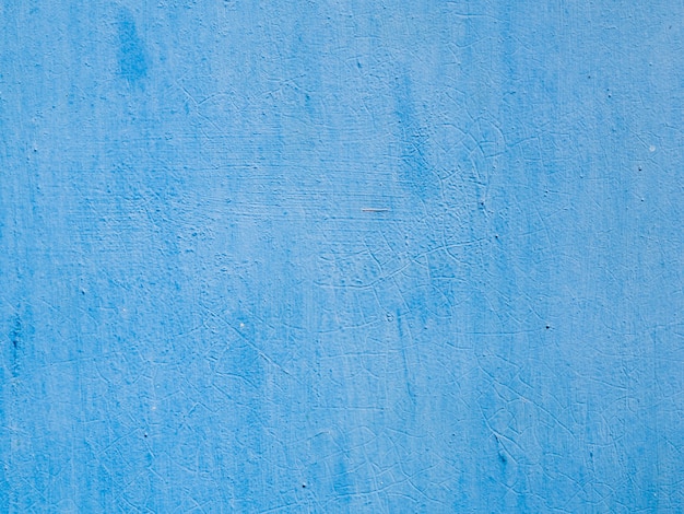 Free photo blue painted textured wall background