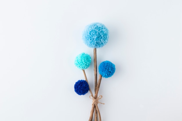 Blue pom poms arrangement above view