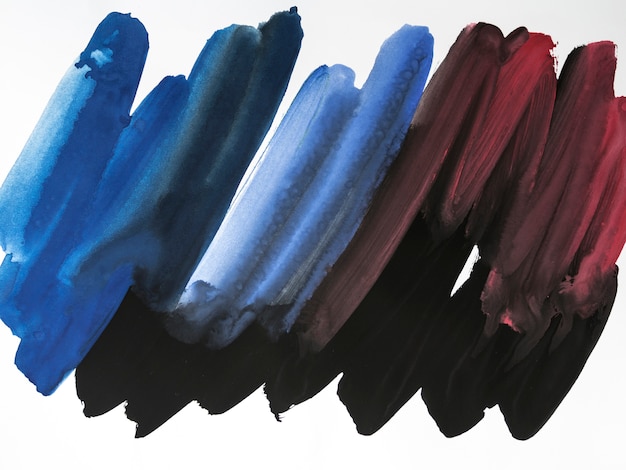 Blue and red brush strokes on white background