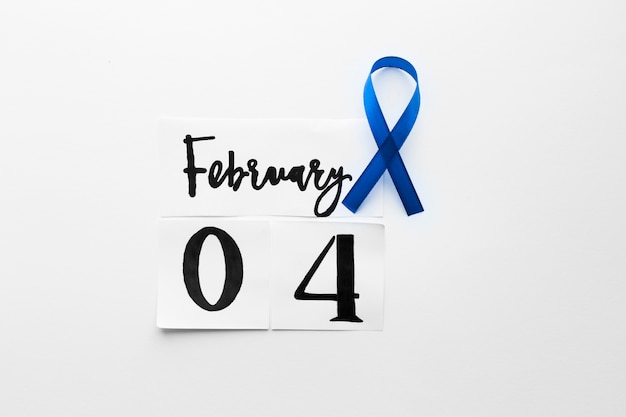 Free Photo blue ribbon and february 4 writing