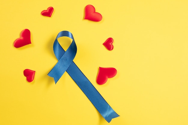 Free photo blue ribbon symbolic of prostate cancer awareness campaign and men's health in november