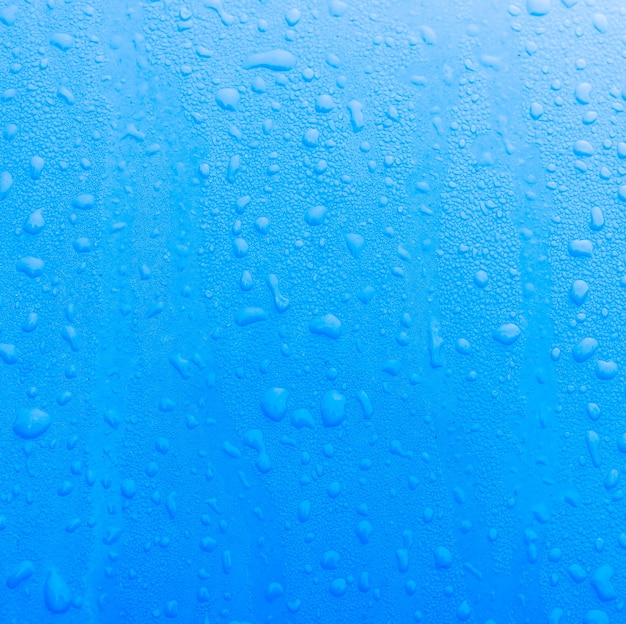 Free photo blue texture with water droplets