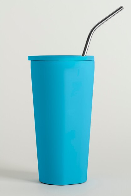 Free Photo blue tumbler with a straw design resource