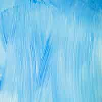 Free photo blue wall with brushstrokes texture