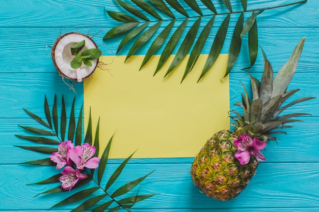 Blue wooden surface with summer fruits and blank space