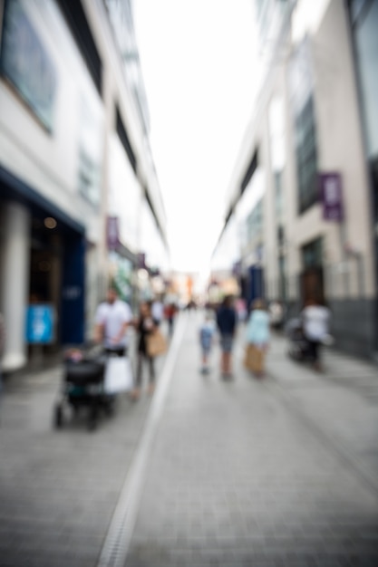 Blur view of pedestrian walking on street