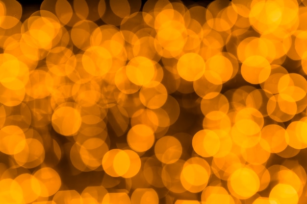 Free Photo blurred golden bokeh background