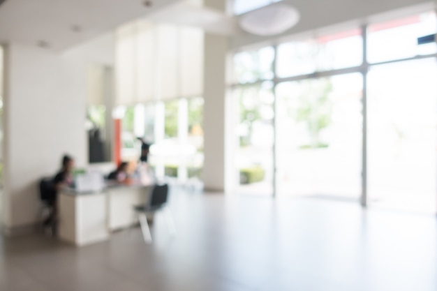 Blurred hotel reception with people sitting