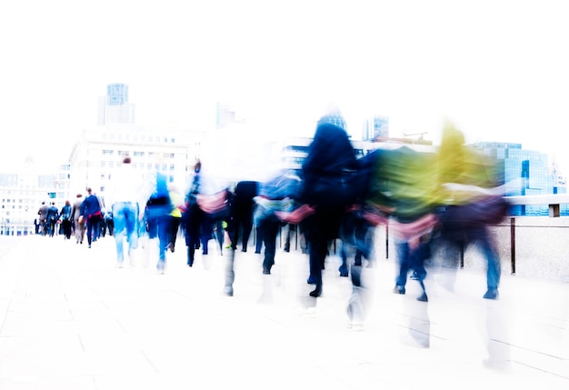 Blurred scene of crowded people walking in a rush