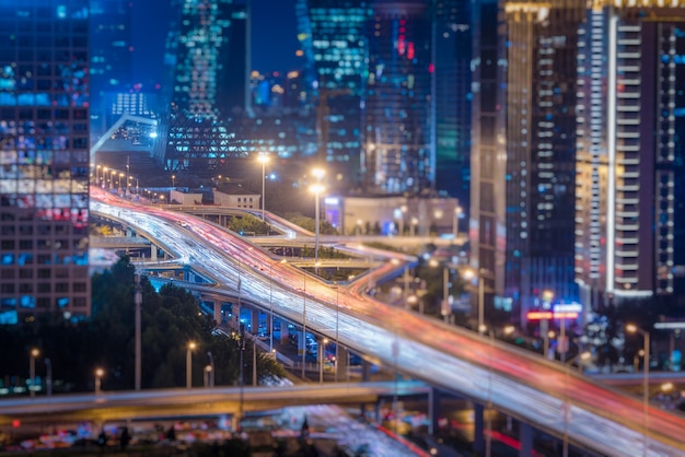 blurred traffic light trails on road