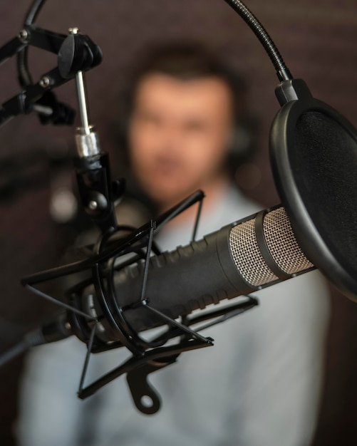 Blurry man with radio equipment