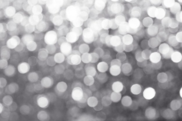 Blurry shiny silver glitter textured background