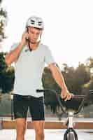 Free photo bmx rider talking at the phone