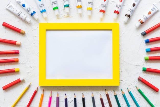 Board surrounded by painting material