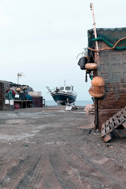 Boat on shore at seaside